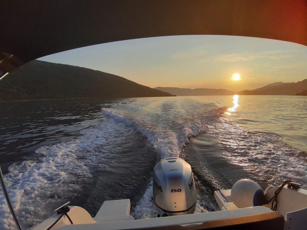 speed boat sunset