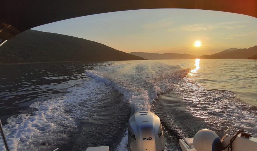 speed boat sunset